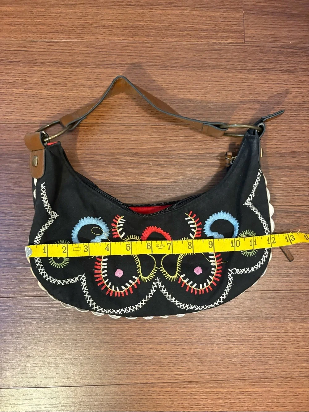 Black shoulder bag with colorful embroidery